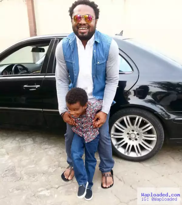 Cute photo of Music producer Cobhams Asuquo with his son
